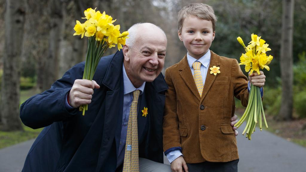Get your company involved in Daffodil Day 2017 Bobby Kerr holding a bouquet of daffodils