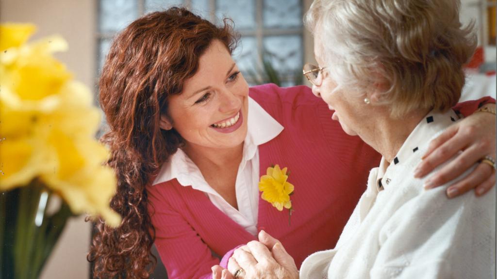 Learn more about the Irish Cancer Society Counselling Service An Irish Cancer Society counsellor comforting a woman