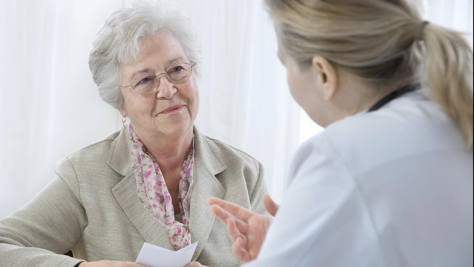 Older woman talking to her doctor