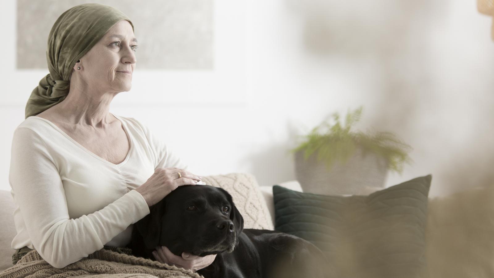 Woman in a head scarf looking concerned